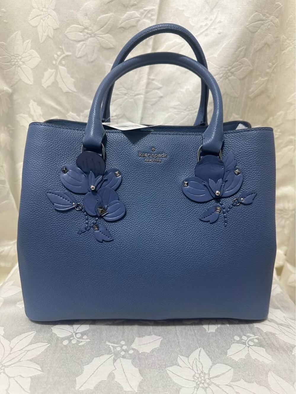 New Kate Spade Blue Pebbled Leather Handbag with Floral Appliques. B-283